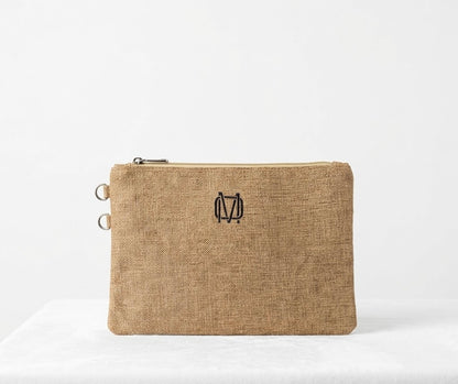 NÉYA — Pochette en raphia